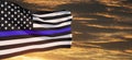 American flag with police support symbol Thin blue line on sunset sky. Royalty Free Stock Photo