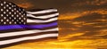 American flag with police support symbol Thin blue line on sunset sky. Royalty Free Stock Photo