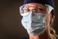 American Flag Reflecting on Female Medical Worker Wearing Protective Face Mask and Goggles Royalty Free Stock Photo