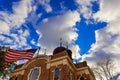 American flag and religious cross at sunset Royalty Free Stock Photo