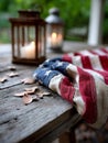 American flag on rustic table with lantern and candles. Royalty Free Stock Photo