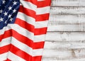 American flag on a rustic wooden background, top view, copy space. Symbol of independence, patriotism Royalty Free Stock Photo