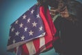 American Flag in Soldier Hands