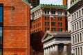 American flag on top of street building in Boston Royalty Free Stock Photo