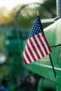 An American flag on a tractor