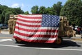 American flag on a tractor during a parade4th of July