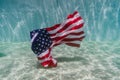 American flag underwater in a pool. 4th july concept, independence day. Nobody Royalty Free Stock Photo