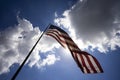 American Flag United States Stars and Stripes Backlit Cloudy Sky Royalty Free Stock Photo