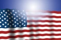 American flag waving with blue background and light reflection. 4th of July. The USA are celebrating patriotic holiday Royalty Free Stock Photo