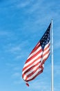 American flag on the blue sky in Key West, USA Royalty Free Stock Photo