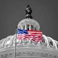American flag waving in front of the Capitol in Washington D.C. Royalty Free Stock Photo