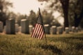 American flag waving in front of a military cemetery , emphasizing the importance of honoring and remembering American service Royalty Free Stock Photo