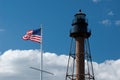 American Flag Waving By Marblehead Lighthouse in Massachusetts Royalty Free Stock Photo