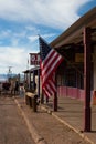 American flag waving at Old Town Tombstone streets