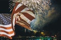 The American flag waving in Sparkling red green yellow celebration fireworks over starry sky. Independence Day, 4th of July, New Y Royalty Free Stock Photo