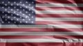 American flag waving in the wind. Close up of USA banner blowing soft silk Royalty Free Stock Photo
