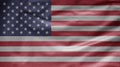 American flag waving in the wind. Close up of USA banner blowing soft silk Royalty Free Stock Photo