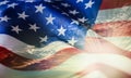 American flag waving in the wind at sunset or sunrise Royalty Free Stock Photo