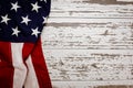 A Crumpled American Flag On A White Plank Background With Copy Space For Holidays Etc.