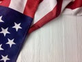 American flag on a white wood surface