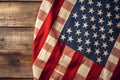 American flag on wooden background. Top view. Copy space for text. Closeup of United States of America flag, shallow depth of