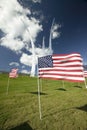 American flags at base of three soaring spires of the Air Force Memorial at One Air Force Memorial Drive, Arlington, Virginia in