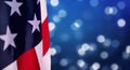 American flags border over defocused blue bokeh lights background. Flyer Royalty Free Stock Photo