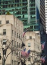 American flags on theÃÂ building waving in the wind on Manhattan Royalty Free Stock Photo