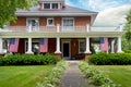 American flags decoration old brick home Royalty Free Stock Photo