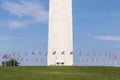 American Flags Encircle Base of Washington Monument Royalty Free Stock Photo