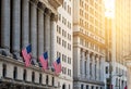 American flags flying in front of the historic buildings of Wall Street in the financial district of Manhattan, New York City Royalty Free Stock Photo