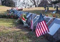 Small American flags and headstones at National cemetery. Royalty Free Stock Photo