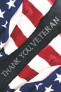 American flags near handwriting of thank you, veterans Royalty Free Stock Photo