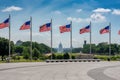 American flags at sunny day and Capitol Building in background in Washington DC Royalty Free Stock Photo