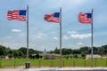 American flags at sunny day and Capitol Building in background in Washington DC Royalty Free Stock Photo