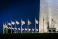 American flags at the Washington Monument at night, in Washington, DC Royalty Free Stock Photo