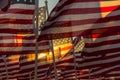 American flags waving at sunset