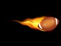 American football ball fire on black background Royalty Free Stock Photo