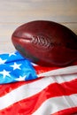 American football ball and old glory flag Royalty Free Stock Photo