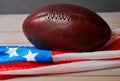 American football ball and old glory flag Royalty Free Stock Photo