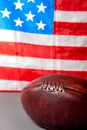 American football ball and old glory flag Royalty Free Stock Photo