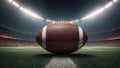 American football ball placed at the center of an empty stadium field, spotlight shining down on it, symbolizing the anticipation