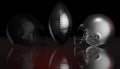 American football black and silver helmets on black dark background, 3d rendering Royalty Free Stock Photo