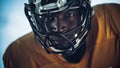 American Football: Close-up of Professional African-American Player Looking at Camera. Hero Athlete Royalty Free Stock Photo