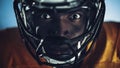 American Football: Close-up of Professional African-American Player Looking at Camera. Hero Athlete Royalty Free Stock Photo