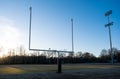 An American Football Field with Goalpost late on a Sunny Day