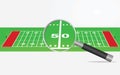 American football field and magnifying glass