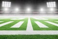 American Football Field With Stadium Lights and Copy Space Royalty Free Stock Photo