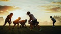 American Football Field Two Teams Compete: Players Pass and Run Attacking to Score Touchdown Points Royalty Free Stock Photo