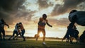 American Football Field Two Teams Compete: Players Pass and Run Attacking to Score Touchdown Points Royalty Free Stock Photo